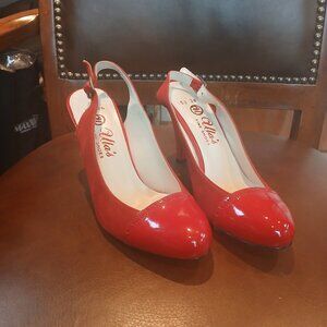 Striking red leather heels to impress. New and unworn.